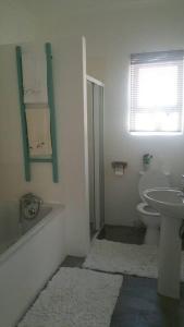 Ванная комната в Huis Maria in Golden Mile