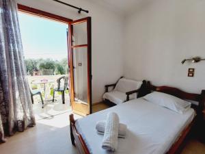 Krevet ili kreveti u jedinici u okviru objekta Corfu Elpis Apartments