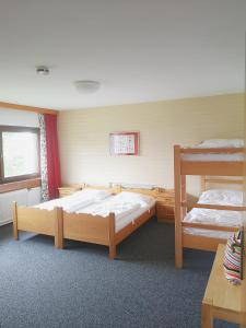 Ein Bett oder Betten in einem Zimmer der Unterkunft Ferienhaus Kurzenhof Radstadt