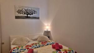 Posteľ alebo postele v izbe v ubytovaní Apartment Lada
