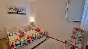 Posteľ alebo postele v izbe v ubytovaní Apartment Lada