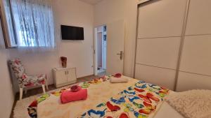 Posteľ alebo postele v izbe v ubytovaní Apartment Lada