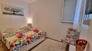 Posteľ alebo postele v izbe v ubytovaní Apartment Lada