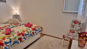 Posteľ alebo postele v izbe v ubytovaní Apartment Lada