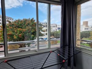 a view from the window of a room at Spacious 2 BR near mausolée med V, 1min walk tram. in Rabat