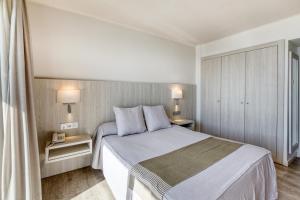 Katil atau katil-katil dalam bilik di Hotel Marina