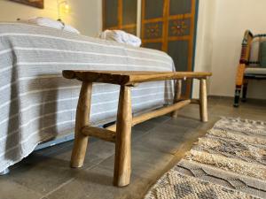 Postel nebo postele na pokoji v ubytování The Way Inn - Boutique Suites
