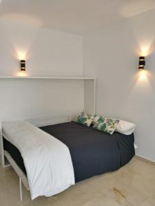 Cama o camas de una habitación en Apartamento Marbella