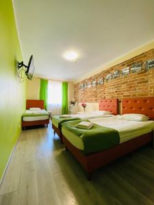 Posteľ alebo postele v izbe v ubytovaní Hostel Freedom