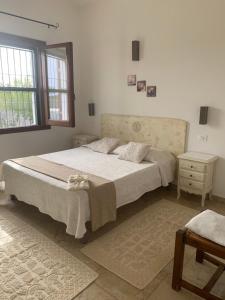 Postel nebo postele na pokoji v ubytování Casa Nerelie'S