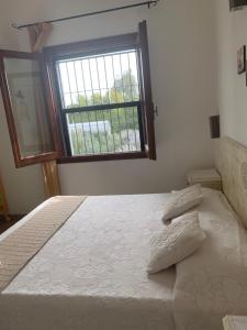 Postel nebo postele na pokoji v ubytování Casa Nerelie'S