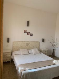 Postel nebo postele na pokoji v ubytování Casa Nerelie'S