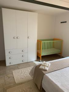 Postel nebo postele na pokoji v ubytování Casa Nerelie'S
