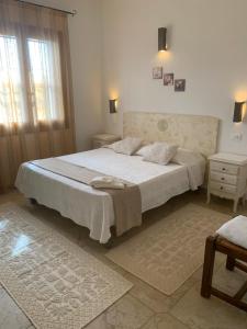Postel nebo postele na pokoji v ubytování Casa Nerelie'S