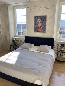 Katil atau katil-katil dalam bilik di La Maison du Bonheur