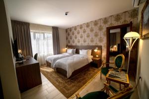 Postel nebo postele na pokoji v ubytování Khan Khediwe Hotel