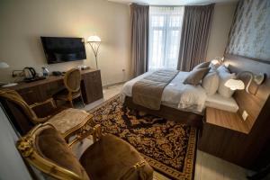 Postel nebo postele na pokoji v ubytování Khan Khediwe Hotel