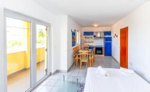 Kuchyň nebo kuchyňský kout v ubytování Apartments Silvia + 17 fotografií