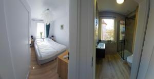 Postel nebo postele na pokoji v ubytování Apartament Botanika