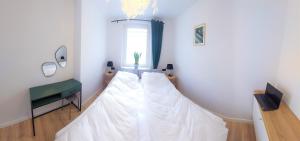Postel nebo postele na pokoji v ubytování Apartament Botanika