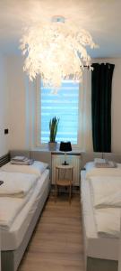 Postel nebo postele na pokoji v ubytování Apartament Botanika