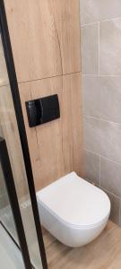 Koupelna v ubytování Apartament Botanika + 21 fotografií