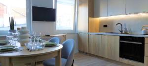 Kuchyň nebo kuchyňský kout v ubytování Apartament Botanika