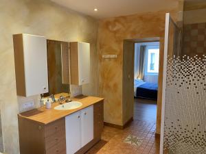 Ванная комната в La Maison du Bonheur