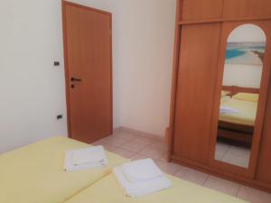 Posteľ alebo postele v izbe v ubytovaní Apartments Barbara Gregovica