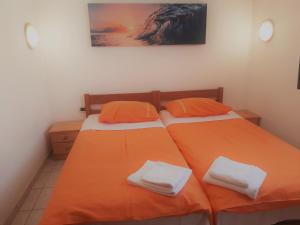 Posteľ alebo postele v izbe v ubytovaní Apartments Barbara Gregovica