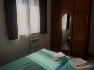 Posteľ alebo postele v izbe v ubytovaní Apartments Barbara Gregovica