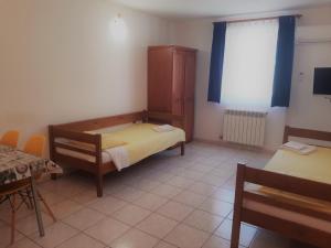 Posteľ alebo postele v izbe v ubytovaní Apartments Barbara Gregovica