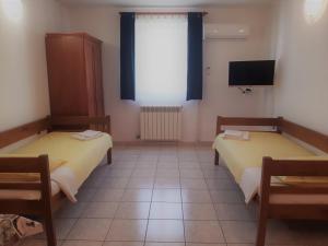 Posteľ alebo postele v izbe v ubytovaní Apartments Barbara Gregovica