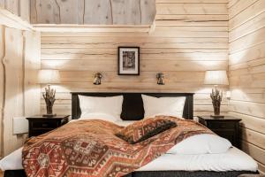 Un pat sau paturi într-o cameră la Namsentunet
