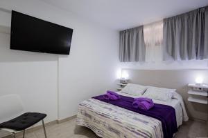 Posteľ alebo postele v izbe v ubytovaní Las Americas Acapulco Costa Adeje + 34 fotografií