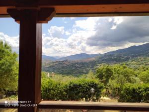 a view from a window of a mountain view at Room in Casa Castiglia a Woodhouse with Beautiful View close Madonie Park in Castelbuono