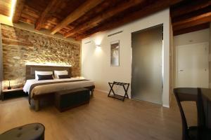 מיטה או מיטות בחדר ב-La Casa in Paese