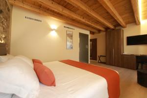 מיטה או מיטות בחדר ב-La Casa in Paese