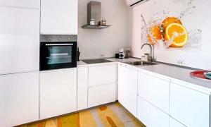 Kuchyň nebo kuchyňský kout v ubytování NOVIGRAD BOUTIQUE APARTMENT