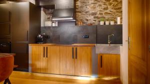 Küche/Küchenzeile in der Unterkunft Saplan Real Estate VILAMOS