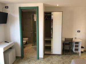 TV a/nebo společenská místnost v ubytování B&B Teta Vieste