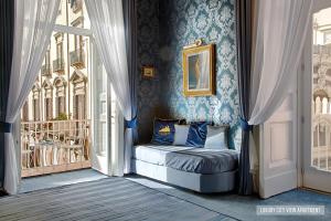 A bed or beds in a room at La Casa Sul Nilo