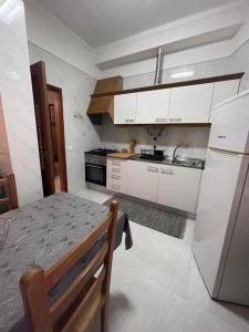 Η κουζίνα ή μικρή κουζίνα στο FarraSea Apartment
