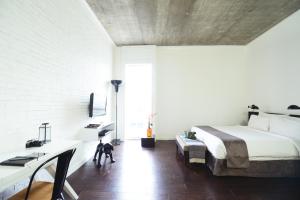 Postel nebo postele na pokoji v ubytování Morrissey Hotel