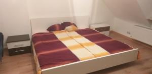 Säng eller sängar i ett rum på Schöne Wohnung in Saarbrücken