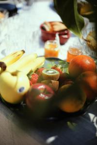 a plate of fruits and vegetables on a table at Bed & Breakfast Spigolatrice in Sapri +37 photos
