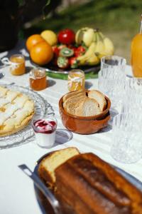 a table with bread and other foods on it at Bed & Breakfast Spigolatrice in Sapri