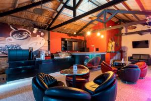 Area lounge atau bar di Hotel Chicamocha