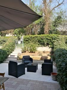 Kawasan patio atau luaran di La Casetta, appartamento nel verde a Sommacampagna
