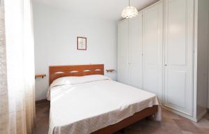 Posteľ alebo postele v izbe v ubytovaní Casa Fiori di Pesco - Goelba